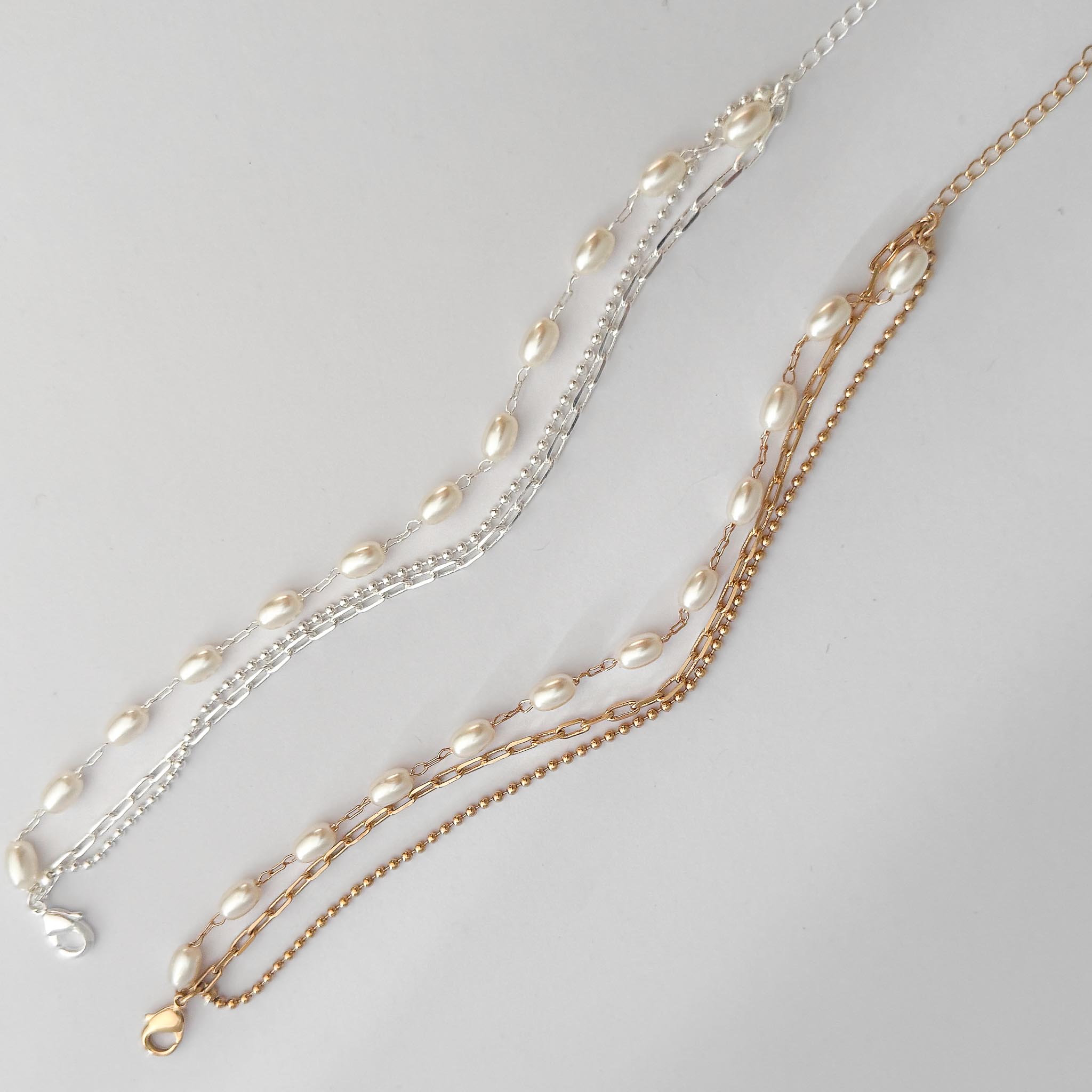 Pulseira Tripla - Pérolas e Correntes